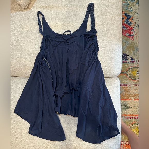 Super cute navy flowy top. Size small in excellent condition. Only worn once. - Picture 3 of 3
